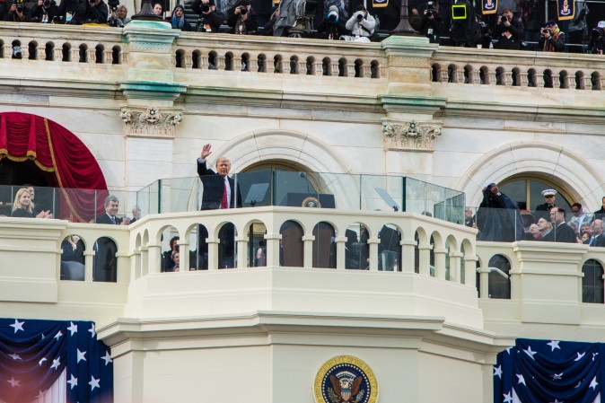 President Donald Trump waves after being sworn in as the 45th president of the United States during the 58th Presidential Inauguration at the U.S. Capitol in Washington, on Jan. 20, 2017. (Benjamin Chasteen/Epoch Times)