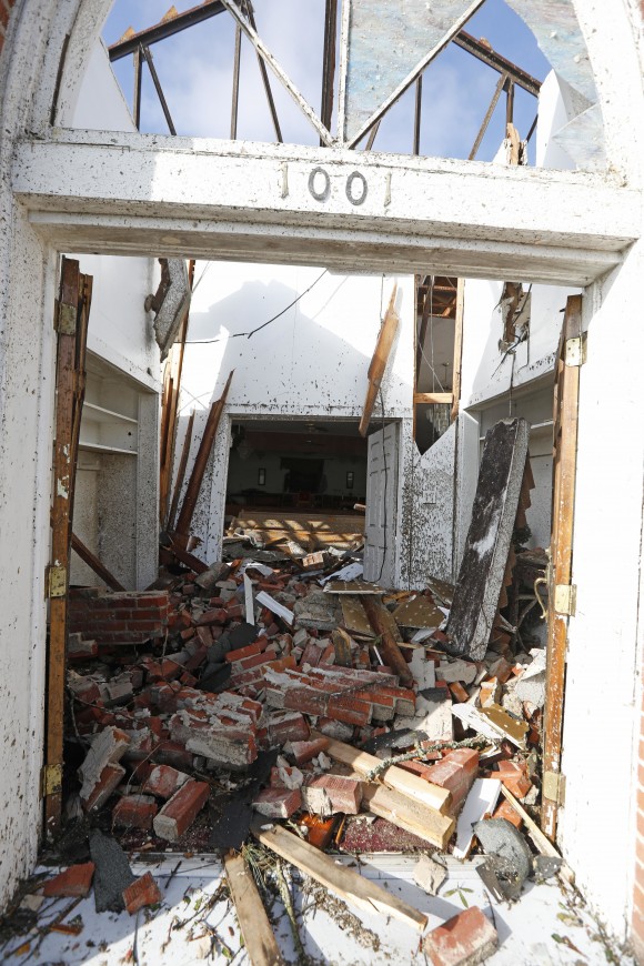 Little remains undamaged of the interior of Cottrell Memorial CME Church after a morning tornado hit in south Hattiesburg, Miss., early on Jan. 21, 2017. (AP Photo/Rogelio V. Solis)