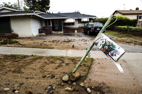 Mud and debris from the previous storm have damaged a mailbox along Melcanyon Road below the recent Fish fire burn area in Duarte on Sunday morning, Jan. 22, 2017. Authorities issued mandatory evacuation orders for homes surround Valley View Park and Valley View Elementary School. (Watchara Phomicinda/Los Angeles Daily News via AP)