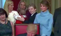 Barron Trump Plays ‘Peek-a-Boo’ With Nephew as Father Signs Executive Orders