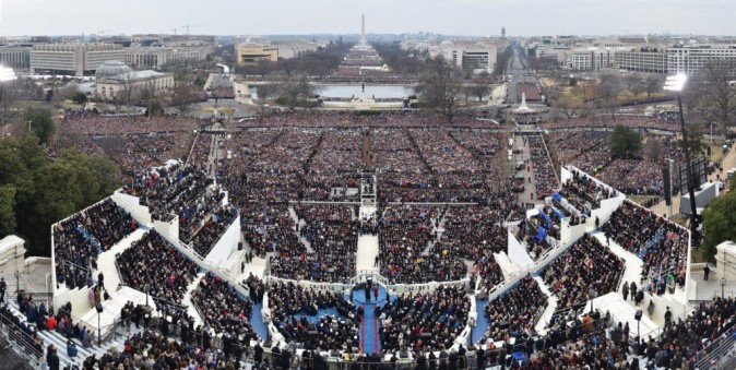People look on during the Inauguration of President Donald Trump on January 20, 2017 at the U.S. Capitol in Washington, D.C. In today's inauguration ceremony Donald J. Trump becomes the 45th president of the United States. (Photo by Ricky Carioti - Pool/Getty Images)
