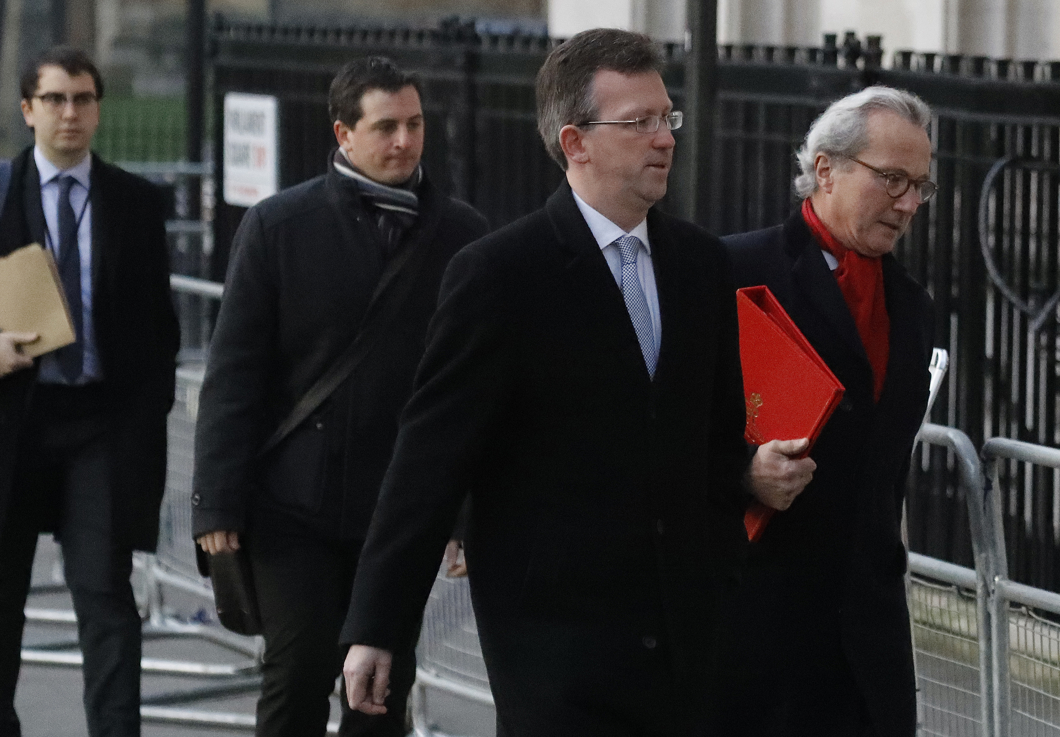 Britain's Attorney General Jeremy Wright, second right, arrives at the Supreme Court in London on Jan. 24, 2017. (AP Photo/Frank Augstein)