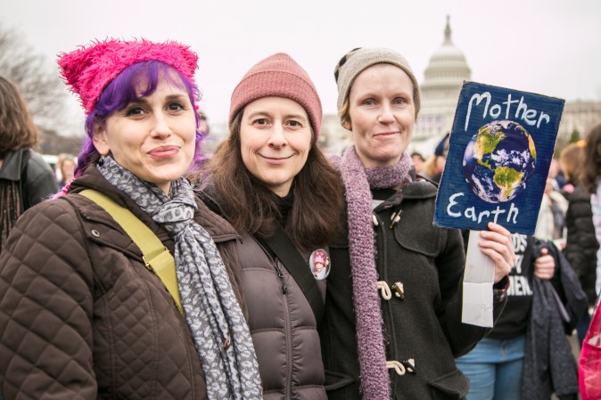 Maddi Wallach (R) and Estelle L'heureux (L) from Maine at the Woman's March on Washington on Jan. 21. (Benjamin Chasteen/Epoch Times)