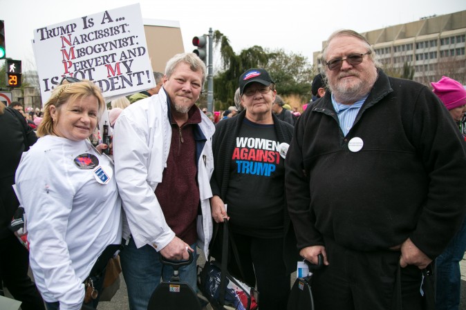 Kathy and Allen Jones from North Carolina (L) and Roger Jones and his wife from Florida at the Woman's March on Washington on Jan. 21. (Benjamin Chasteen/Epoch Times)