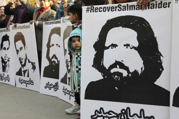 Activists from Pakistan's civil society demand recovery of missing persons, in Lahore, Pakistan on Jan. 12, 2017. Pakistan's controversial blasphemy law which demands death to anyone accused of insulting Islam or its prophet has been a rallying cry for extremist groups who threaten violence at any attempt to prevent abuses, never mind repeal it. (AP Photo/K.M. Chaudhry)