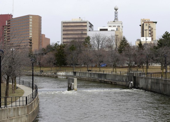 FILE - This Feb. 5, 2016, file photo, shows the Flint River in Flint, Mich. Michigan environmental officials announced Tuesday, Jan. 24, 2017, that Flint's water system no longer has levels of lead exceeding the federal limit. The finding by the Department of Environmental Quality is good news for a city whose 100,000 residents have grappled with the man-made water crisis since 2014. (AP Photo/Carlos Osorio, File)