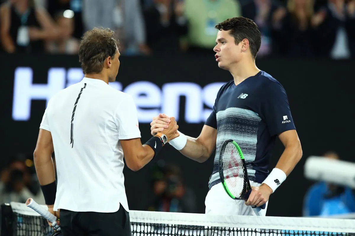 Milos Raonic congratulates Rafael Nadal on his Australian Open quarterfinal win on Jan. 25, 2017 in Melbourne, Australia. (Cameron Spencer/Getty Images)