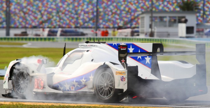 Loic Duval limps around the track in the crippled #81 Dragonspeed Oreca after hitting the wall in Practice 2. (Chris Jasurek/Epoch Times)