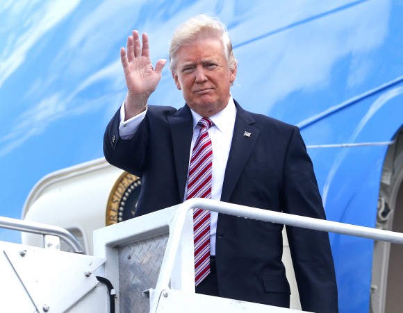 President Donald Trump arrives on Air Force One at Philadelphia International Airport on Jan. 26, 2017. (AP Photo/Pablo Martinez Monsivais)