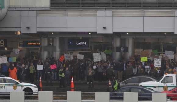Protesters gather at the Miami International Airport against the executive order that President Donald Trump signed clamping down on refugee admissions and temporarily restricting travelers from seven predominantly Muslim countries in Miami, Florida on Jan. 29, 2017. Demonstrators gathered at airports across the country in protest of the order. (Joe Raedle/Getty Images)