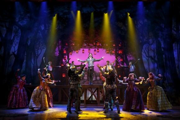 "Something Rotten!" required both outdoor and interior scenes of Bottom's house, a platform for Bard's big number (pictured here), room for the Bottom's theater company, to name just a few changes. As with the trees in the background, Scott Pask used old-fashioned painted drops, large cloths that can be quickly raised or lowered from above to accommodate transitions between scenes. This method not only fits a play set in Shakespeare's era, but also better accommodates the St. James Theatre that lacks stage depth. (Joan Marcus)