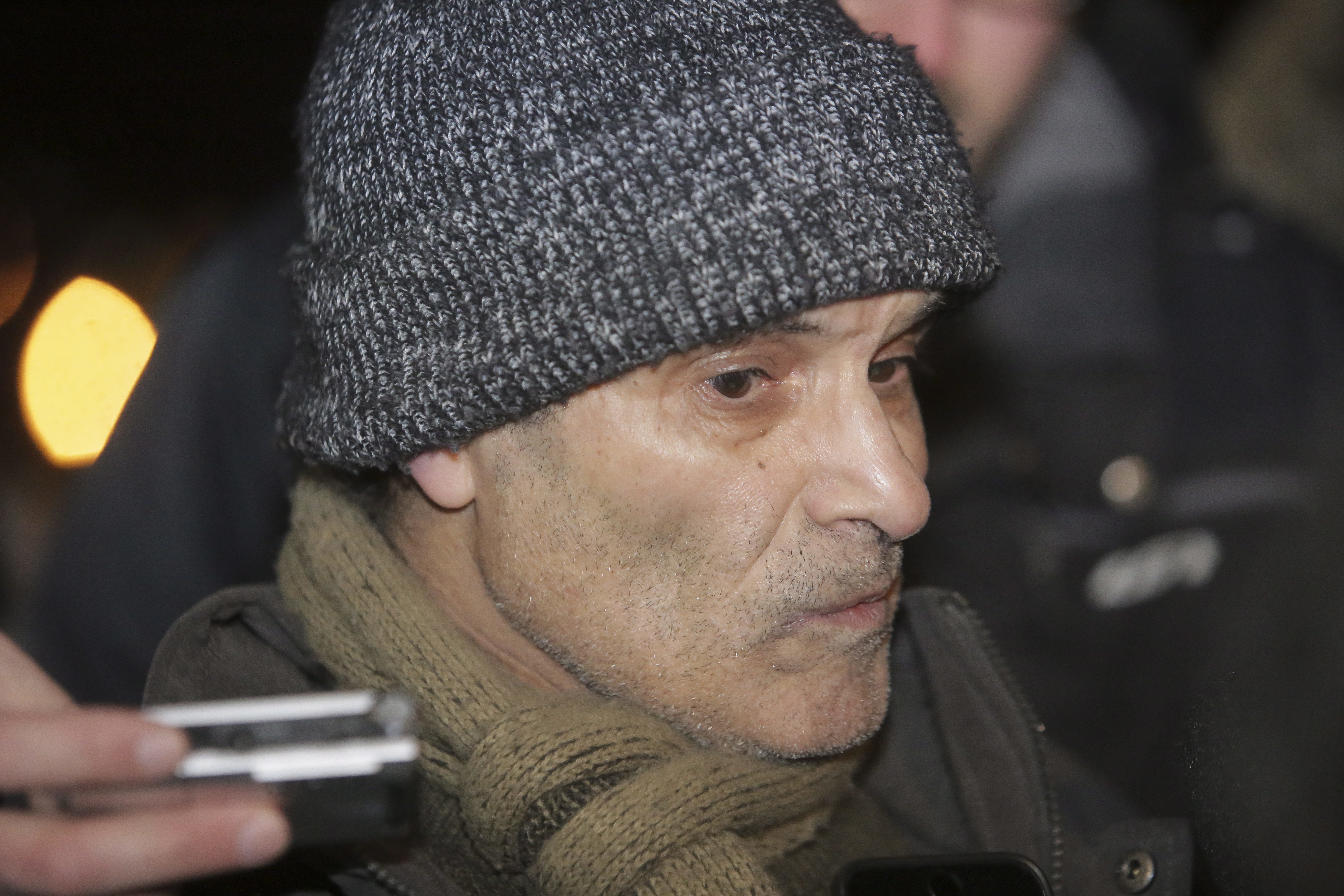 Mohamed Oudghiri speaks with the media near a Quebec City mosque after a deadly shooting on Jan. 29, 2017. (Francis Vachon/The Canadian Press via AP)
