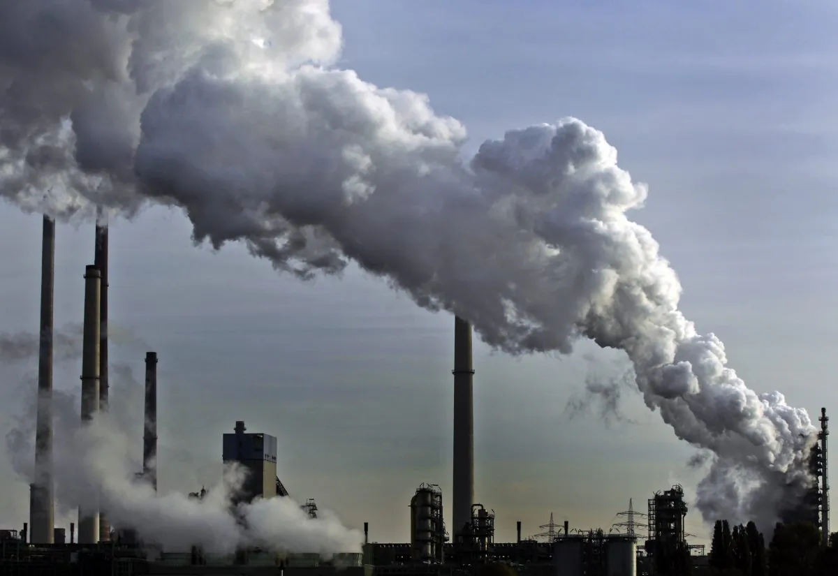 Steam rises from the chimneys in the industrial area in Duisburg , Germany, on Oct. 29, 2010. (AP Photo/Frank Augstein, File)