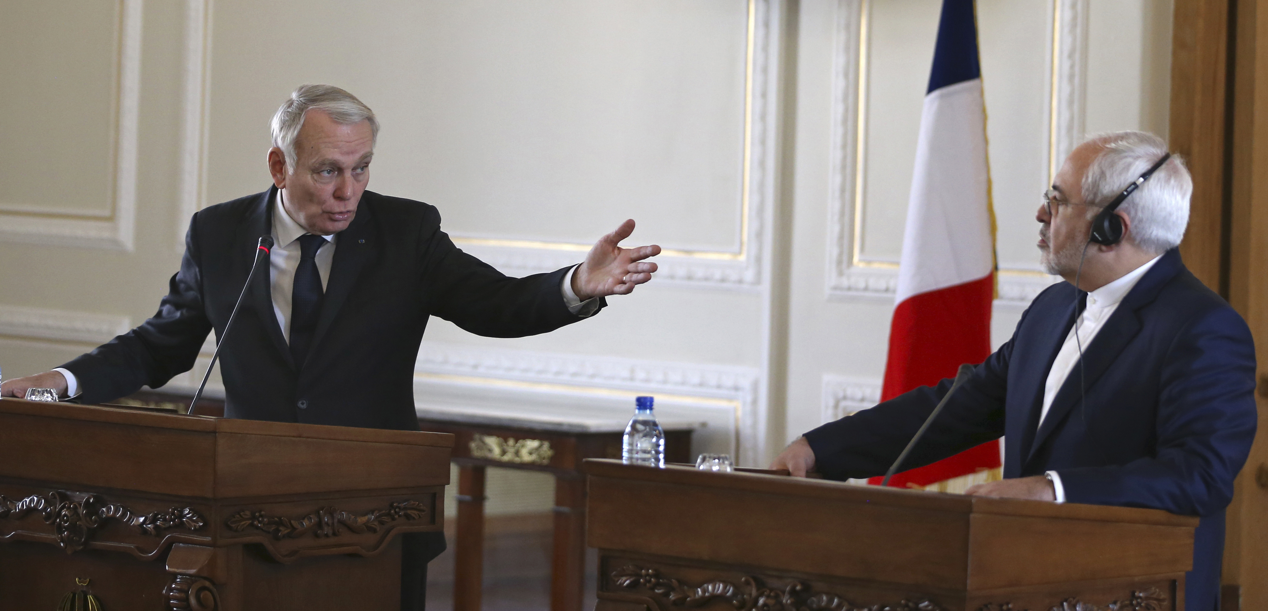 French Foreign Minister Jean-Marc Ayrault (L) speaks during a joint press conference with his Iranian counterpart Mohammad Javad Zarif in Tehran, Iran on Jan. 31, 2017. (AP Photo/Vahid Salemi)