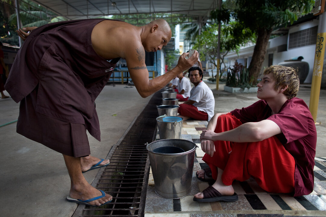 Sean Lampon,19, from Alaska gets advice at the Thamkrabok monastery in Saraburi, Thailand. (Paula Bronstein /Getty Images)
