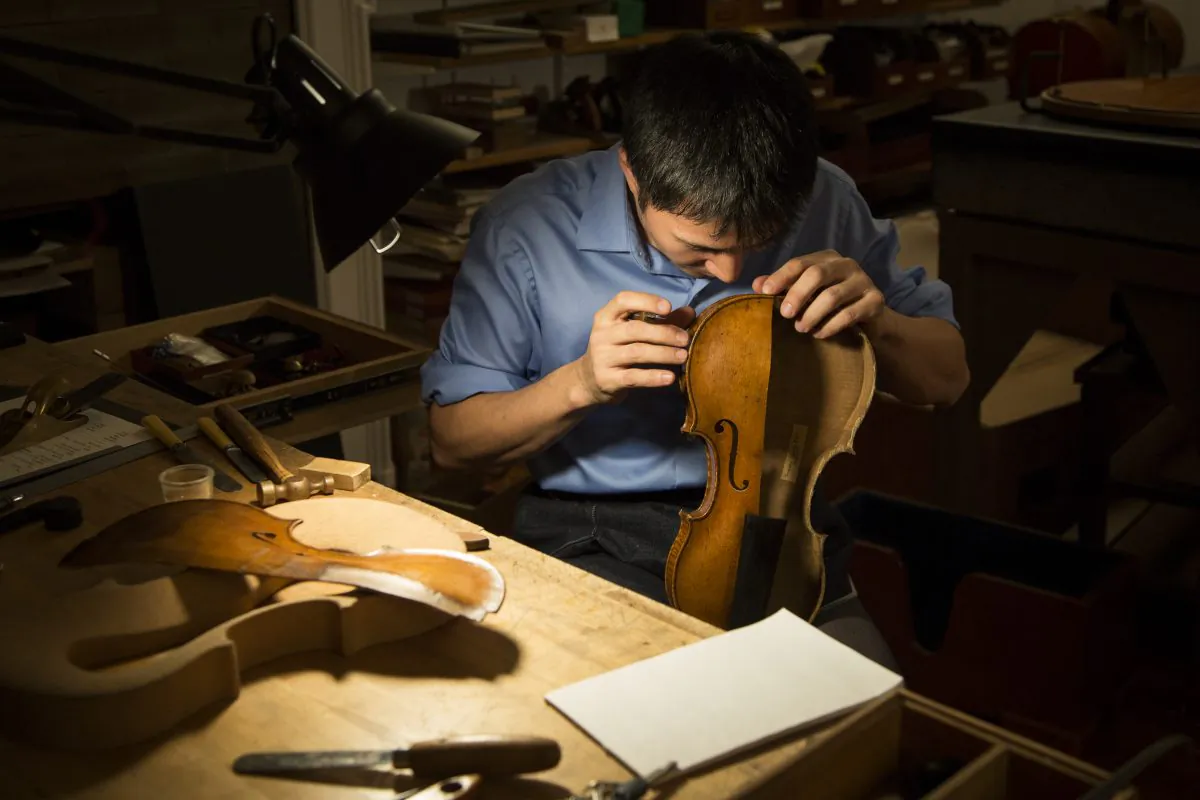 Tatsuo Imaishi at the restoration shop of Rare Violins of New York in Manhattan, New York, on Jan. 9, 2017. (Samira Bouaou/Epoch Times)