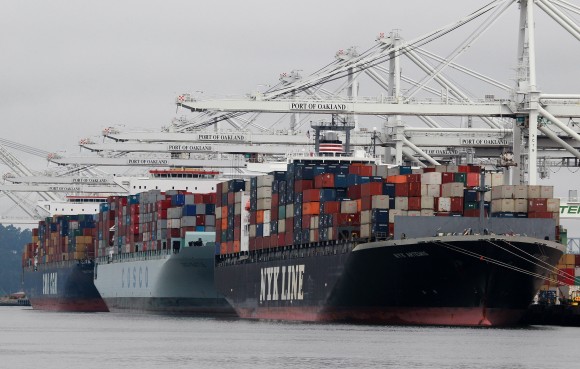 Container ships are positioned under cranes at the Port of Oakland in Oakland, Calif., on Aug. 16, 2010. (Justin Sullivan/Getty Images)