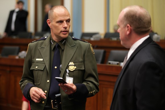 Border Patrol Deputy Chief Ronald Vitiello and U.S. Immigration and Customs Enforcement Executive Associate Director for Enforcement and Removal Operations Tom Homan prepare to testify before the House Judiciary Committee about a surge of unaccompanied Central American minors who have been crossing the U.S.-Mexico border in the Rayburn House Office Building on Capitol Hill in Washington, DC on June 25, 2014. Laying blame with the Obama Administration, the committee heard testimony from U.S. Immigration and Customs Enforcement officials and others about the more than 52,000 immigrant children who have crossed the border alone since October of 2013. (Chip Somodevilla/Getty Images)