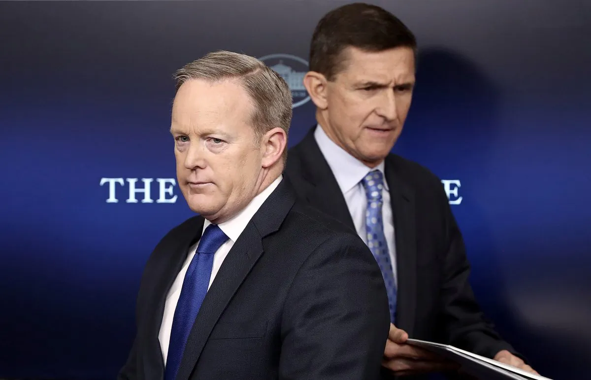 White House Press Secretary Sean Spicer (L) yields the briefing room podium to National Security Adviser Michael Flynn in Washington on Feb. 1, 2017. Flynn said the White House is "officially putting Iran on notice" for a recent missile test and support for Houthi rebels in Yemen. (McNamee/Getty Images)