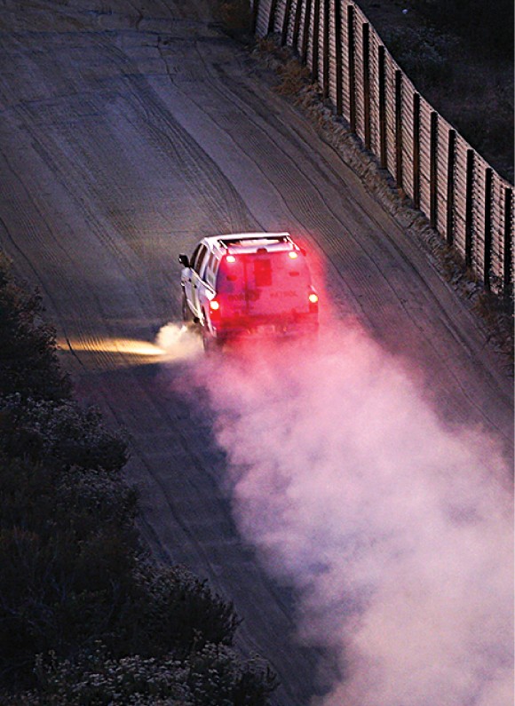 Border Patrol agents check the U.S.–Mexico border near Campo, Calif., in this file photo. (David McNew/Getty Images)