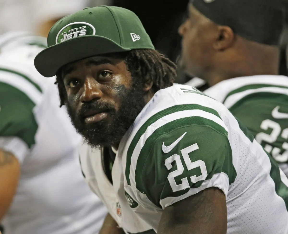 New York Jets running back Joe McKnight watches from the bench during the fourth quarter of an NFL football game against the St. Louis Rams in St. Louis on Nov. 18, 2012. (AP Photo/Tom Gannam)