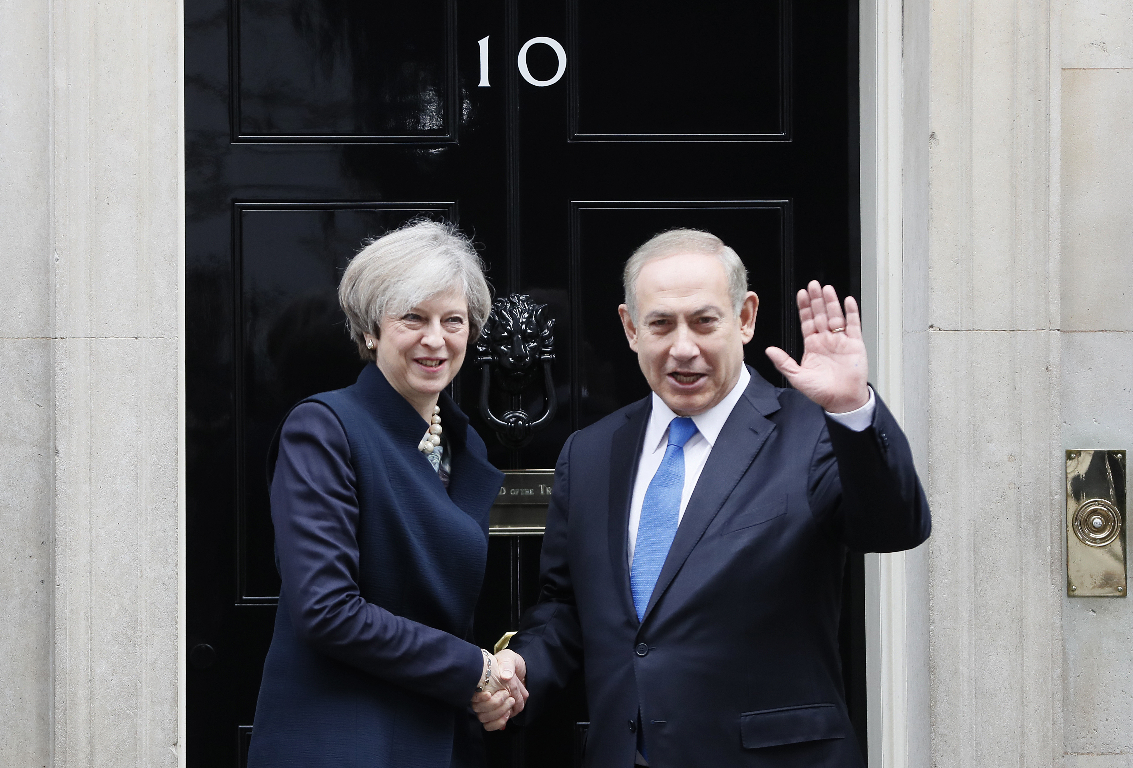 Britain's Prime Minister Theresa May greets Prime Minister Benjamin Netanyahu of Israel at Downing Street in London on Feb. 6, 2017. (AP Photo/Kirsty Wigglesworth)
