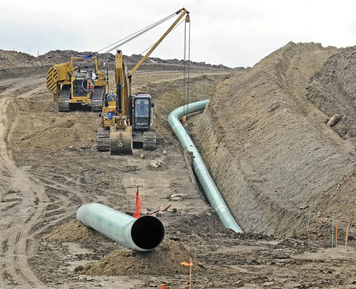 Heavy equipment at a site where sections of the Dakota Access Pipeline were being buried near the town of St. Anthony in Morton County, N.D., in a file photo. (Tom Stromme/The Bismarck Tribune via AP)