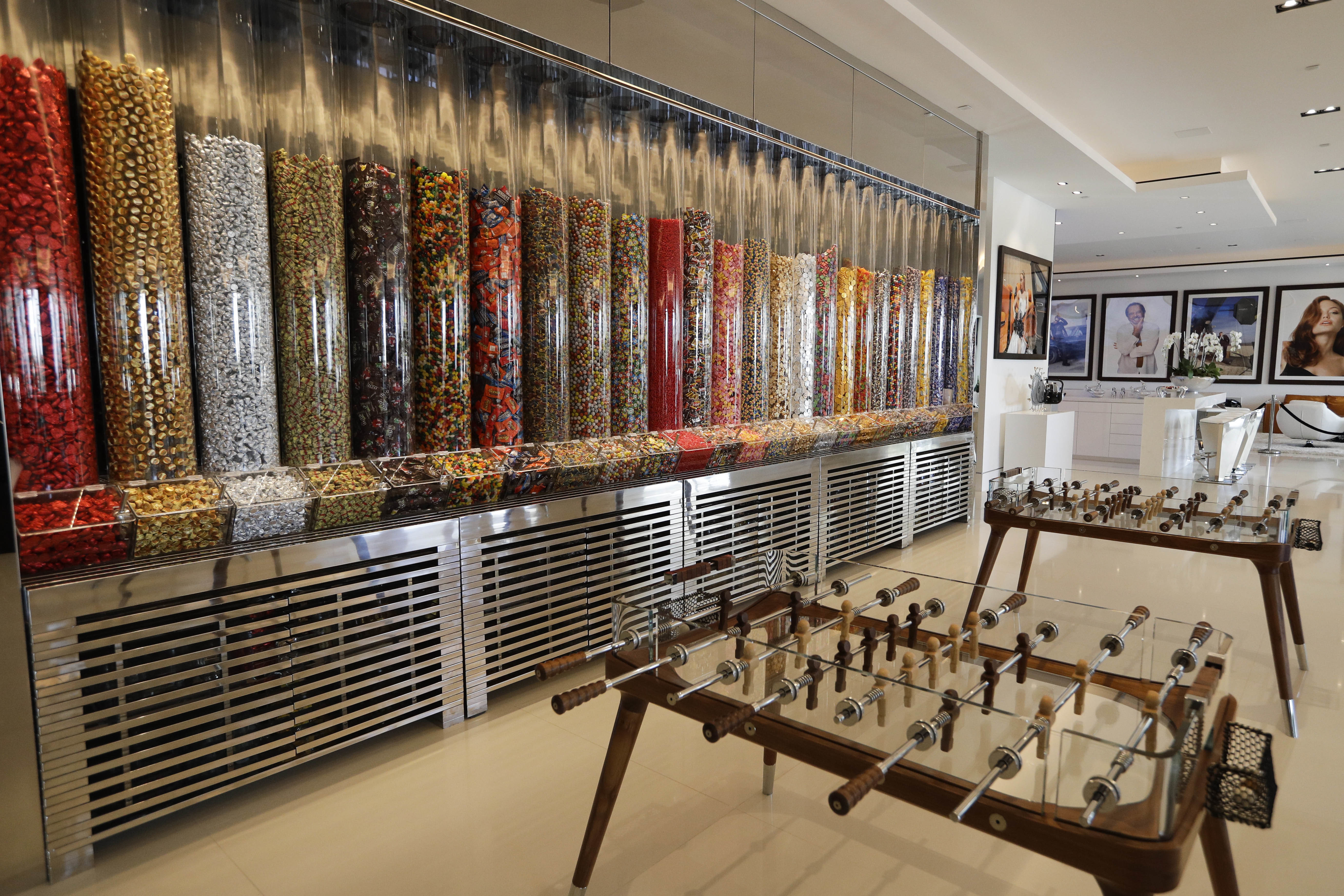 A wall of candy dispensers in the lounge area of a $250 million mansion in the Bel-Air area of Los Angeles. (AP Photo/Jae C. Hong)
