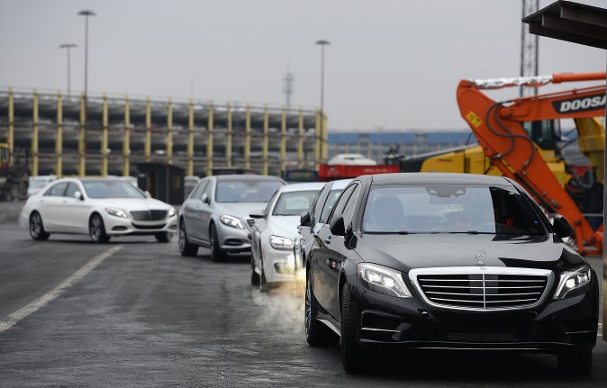 Mercedes cars destined for export overseas wait to be loaded onto ships in Bremerhaven, Germany, on Jan. 22, 2014. (David Hecker/Getty Images)