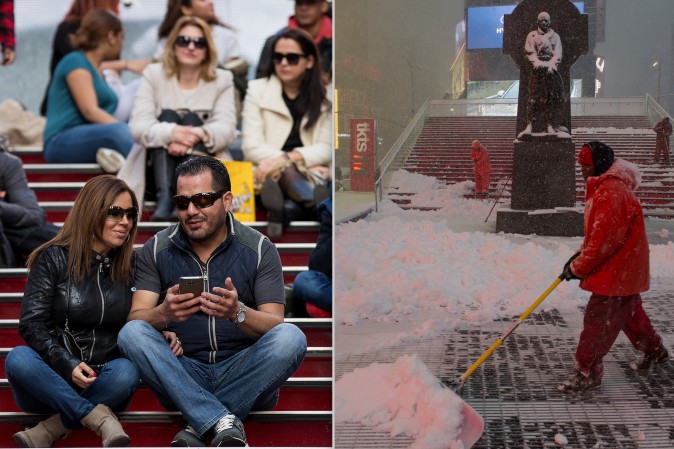 People sit atop of the stairs of the TKTS ticket booth in Times Square as temperatures reached a high of 60 degrees on Feb. 8, (L) and in less than 12 hours a worker shovels snow in the same area during a massive snow storm on Feb. 9 as temperatures are set to go as low as 5 degrees. (Drew Angerer/Getty Images) 