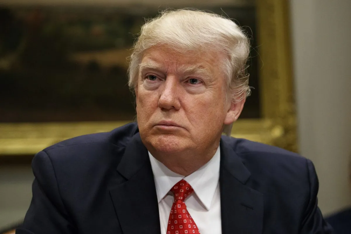 President Donald Trump attends a meeting in the Roosevelt Room of the White House in Washington, Feb. 7, 2017. (AP Photo/Evan Vucci)