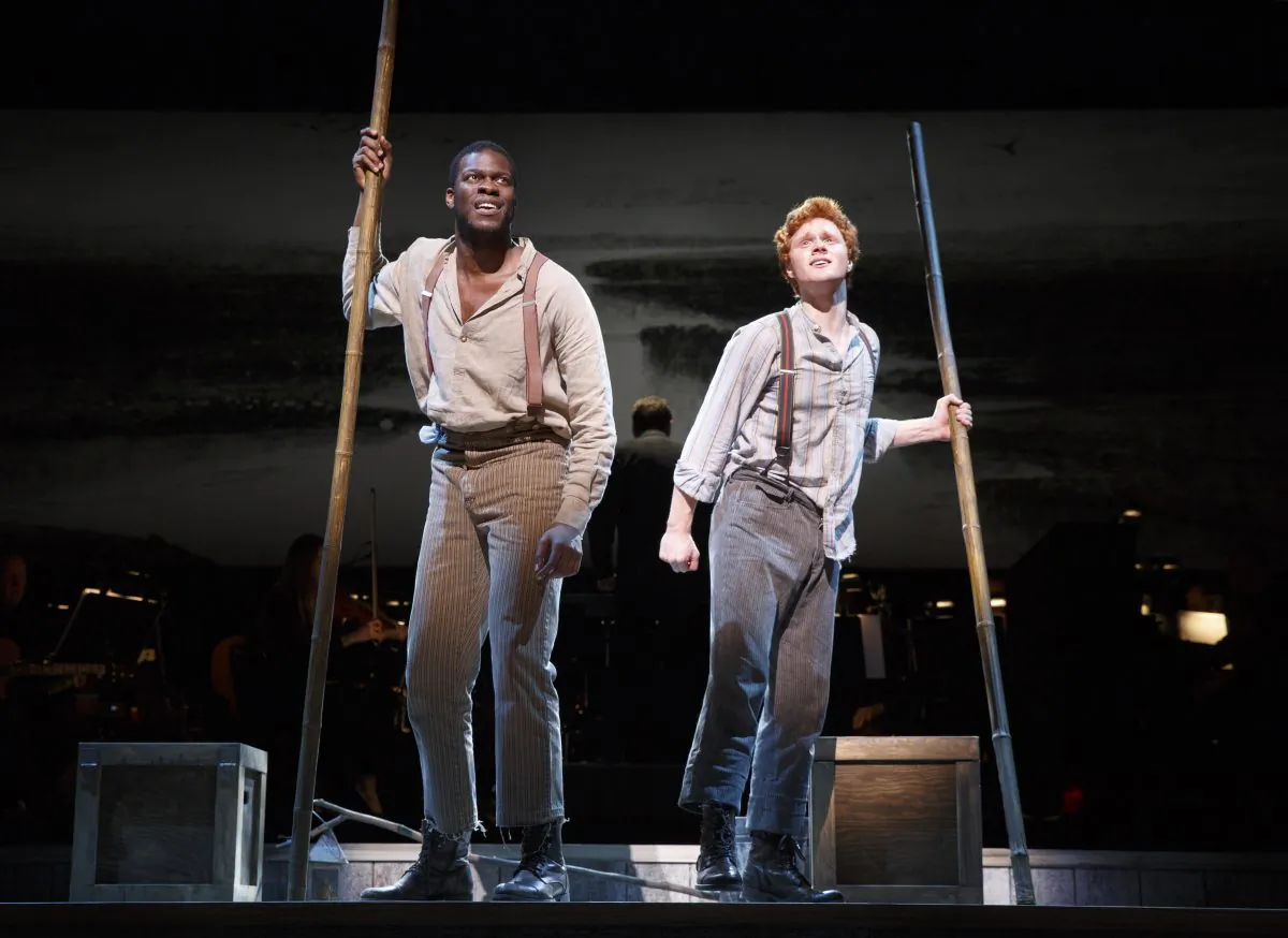 (L–R) Kyle Scatliffe as Jim and Nicholas Barasch as Huck, in the musical “Big River,” based on Mark Twain’s novel “Huckleberry Finn.” (Joan Marcus)