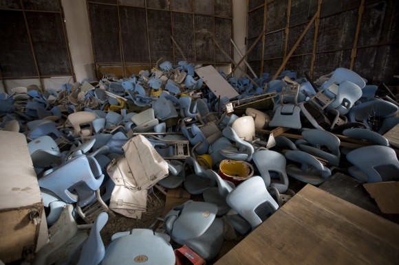 This Feb. 2, 2017 photo shows seats jumbled in a pile inside Maracana stadium in Rio de Janeiro, Brazil. The historic stadium, site of the opening and closing ceremony, has been vandalized as stadium operators, the Rio state government, and Olympic organizers, have fought over $1 million in unpaid electricity bills and management of the venue. (AP Photo/Silvia Izquierdo)