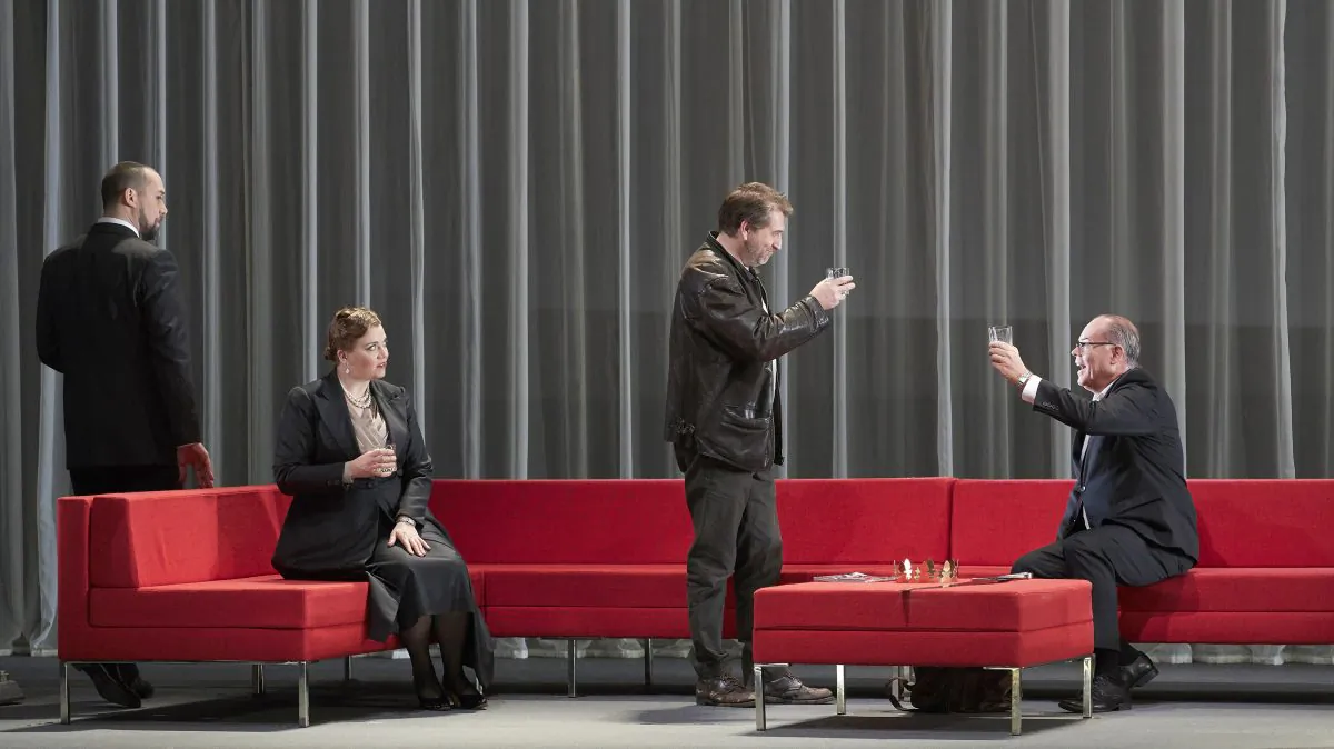  (L-R) Ain Anger as Hagen, Ileana Montalbetti as Gutrune, Andreas Schager as Siegfried, and Martin Gantner as Gunther in the Canadian Opera Company’s 2017 production of "Götterdämmerung." Director Tim Albery has set the epic story in the corporate world to better resonate with modern audiences.(Michael Cooper)