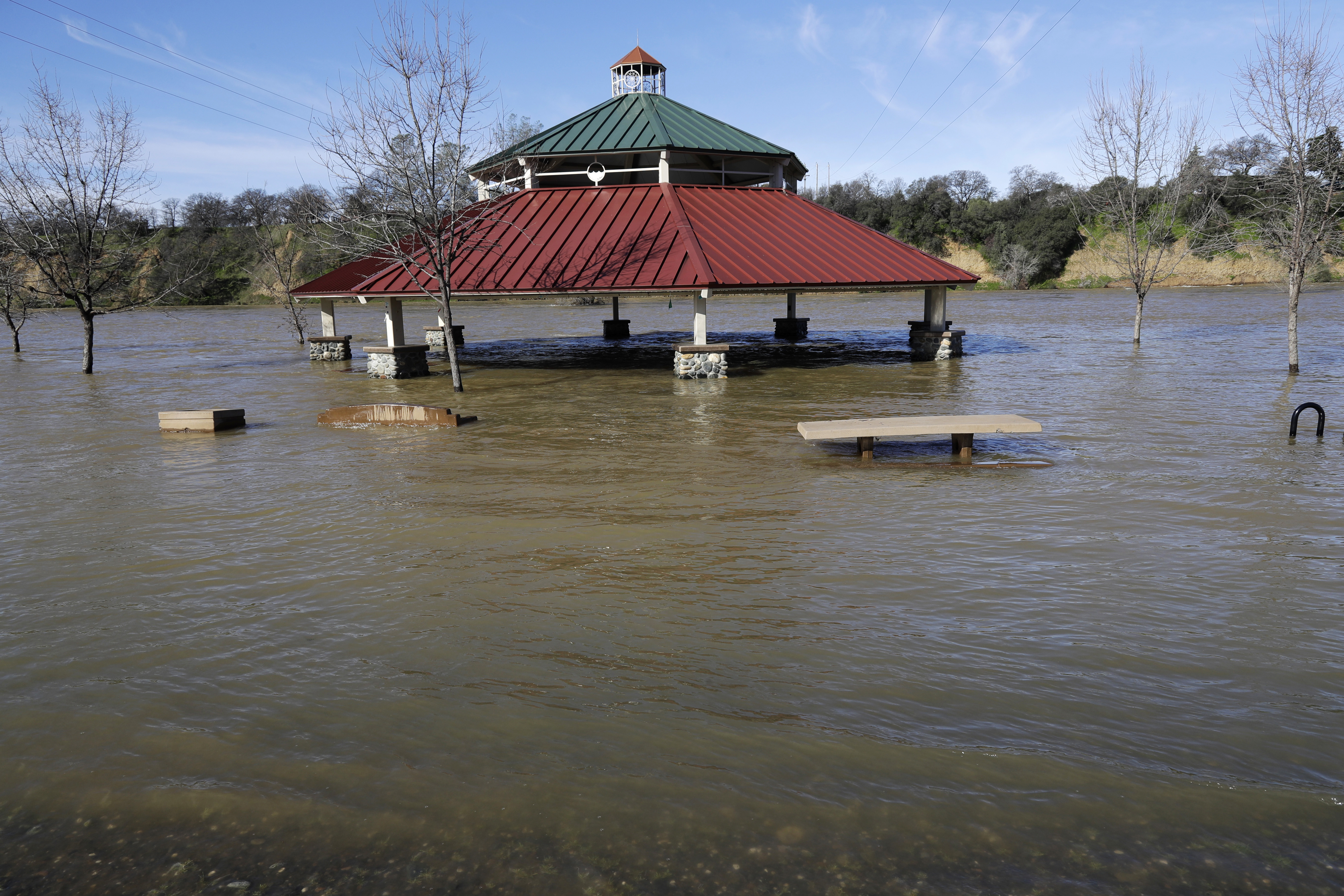 A gazebo is submerged from the overflowing Feather River downstream from a damaged dam at Riverbend Park in Oroville, Calif., on Feb. 14, 2017. (AP Photo/Marcio Jose Sanchez)