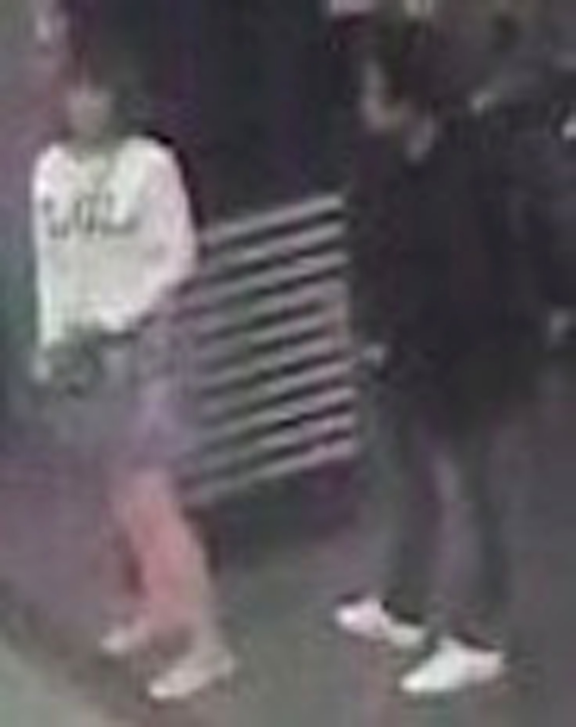 A woman (L) at Kuala Lumpur International Airport in Sepang, Malaysia, who police say was arrested in connection with the death of Kim Jong Nam, the half brother of North Korean leader Kim Jong Un. (Star TV via AP)