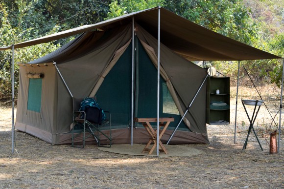 A Robin Pope Safaris spacious mobile walk-in tent with full bedding. (Giannella M. Garrett)