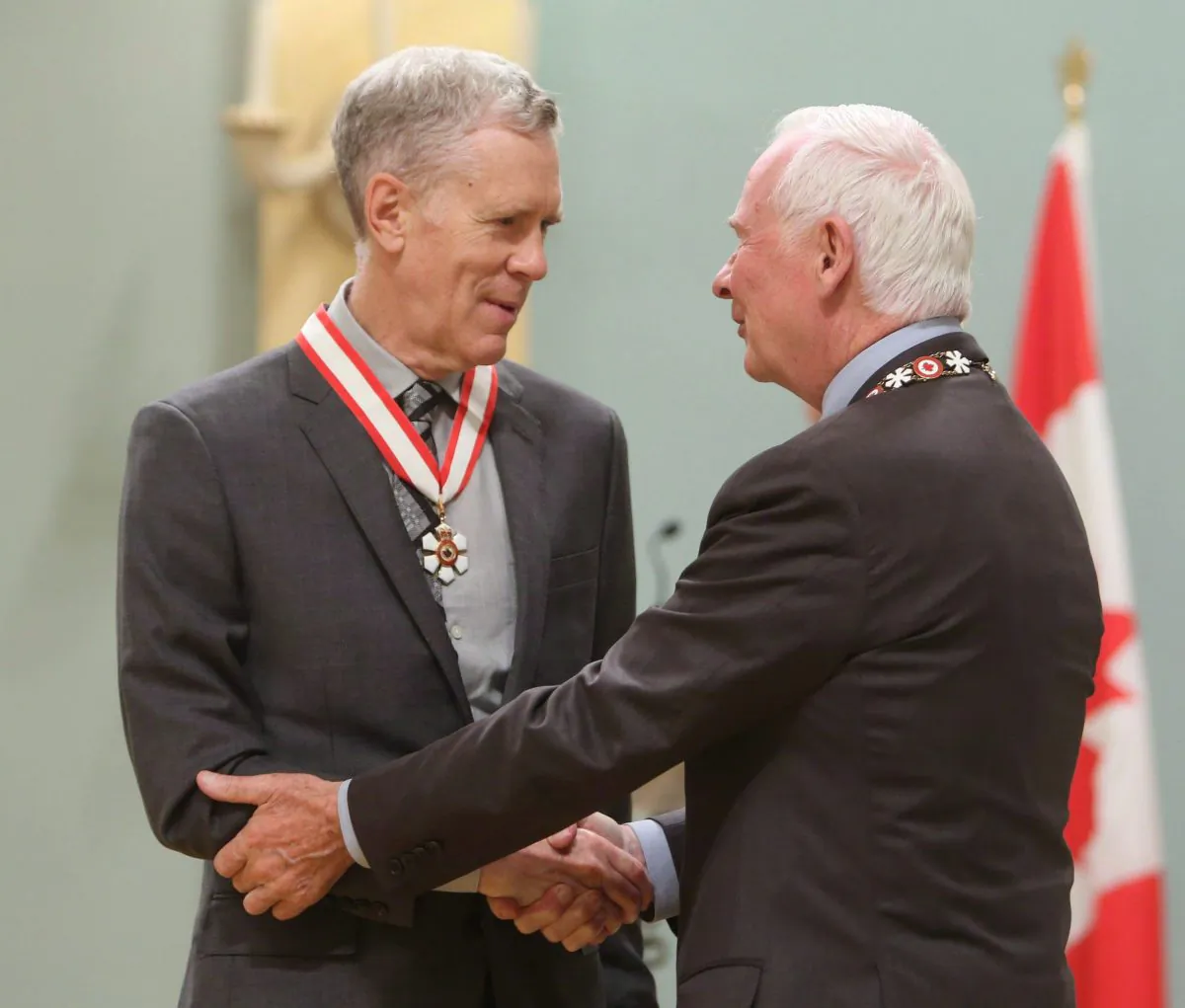 Author and humorist Stuart McLean is presented with the Officer of the Order of Canada medal by Gov. Gen. David Johnston in Ottawa on Sept. 28, 2012. (THE CANADIAN PRESS/Fred Chartrand)