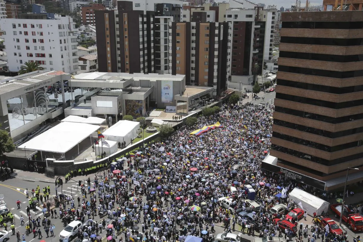 Opposition presidential candidate Guillermo Lasso's supporters protest outside Ecuador's National Electoral Council to demand the official results of the presidential elections, in Quito, Ecuador, on Feb. 20, 2017. (Dolores Ochoa/AP Photo)