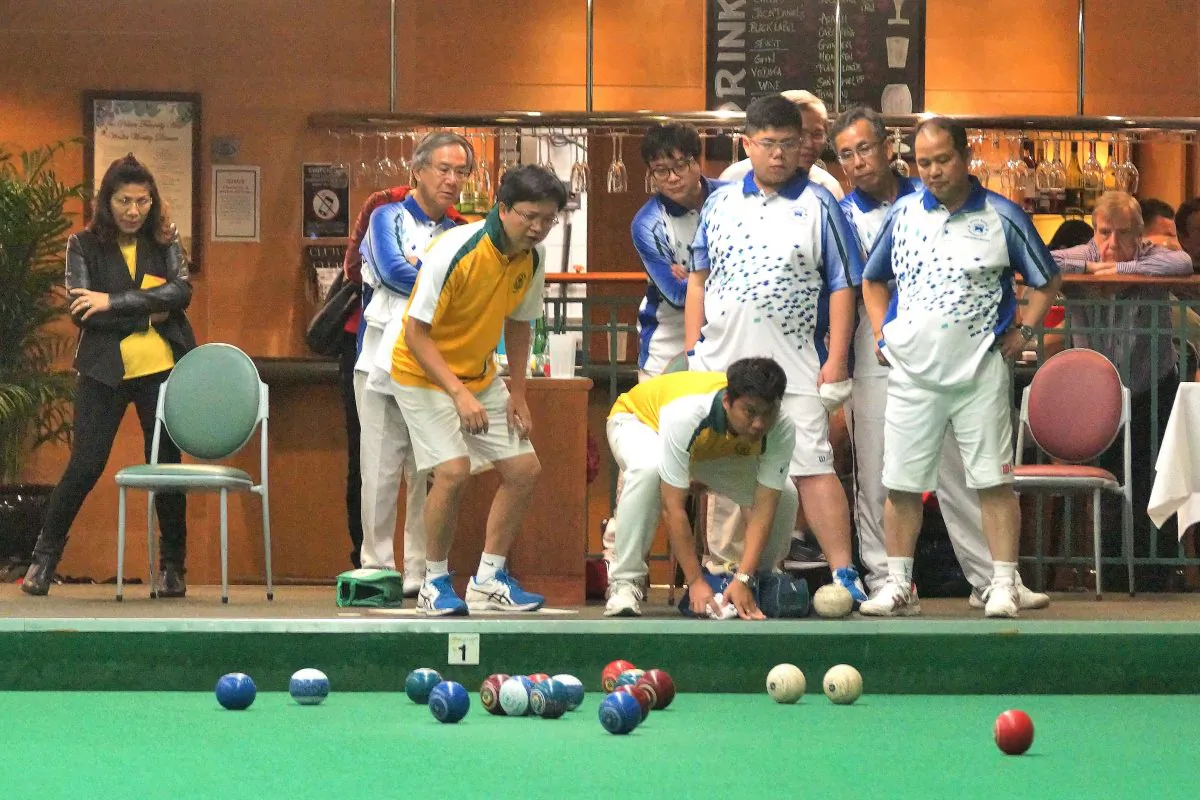 In the last end between Hong Kong Football Club’s Warren Cheung and Craigengower Cricket Club ‘s Kevin Fung (not in photo), Fung used his last shot (red on right) to take out HKFC’s two second shots (the two white bowls on the right) and won four shots in this end. Despite losing the game 20-14, the win in the last end allowed CCC to win the aggregate to take home six points. (Mike Worth)