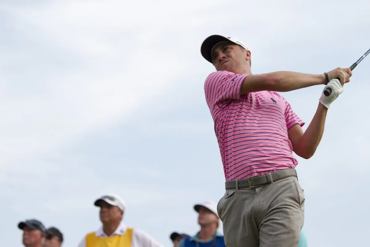 Justin Thomas watches his drive on the 14th tee during the third round of the Sony Open golf tournament, Saturday, Jan. 14, 2017, in Honolulu. (AP Photo/Marco Garcia)
