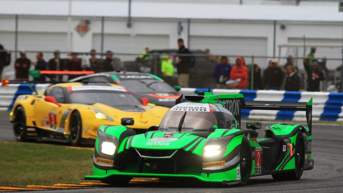 The #2 ESM Nissan DPi rounds Daytona's International Horseshoe during the 2017 Rolex 24. (Chris Jasurek/Epoch Times)