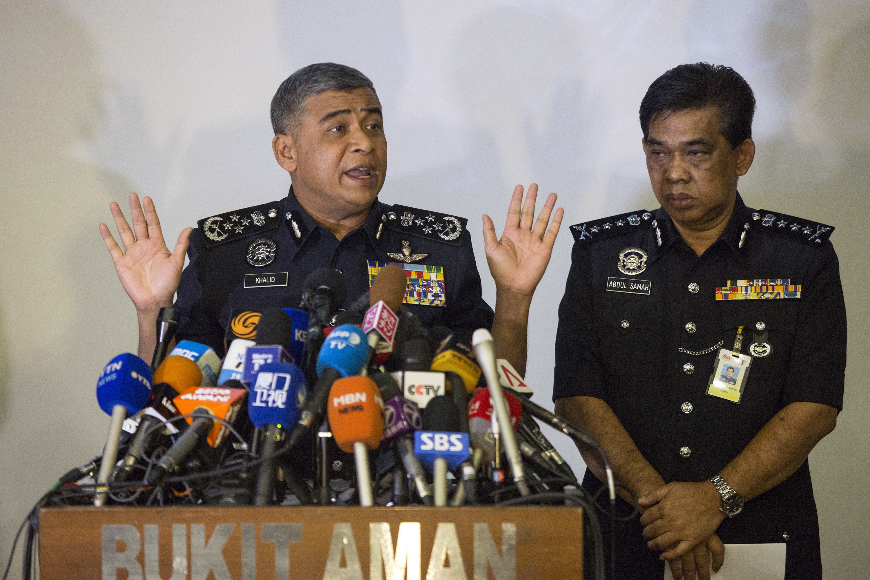 Malaysia's Inspector-General of Police Khalid Abu Bakar (L) and Selangor Police Chief Abdul Samah Mat during a press conference at the Bukit Aman national police headquarters in Kuala Lumpur, Malaysia on Feb. 22, 2017. (AP Photo/Alexandra Radu)