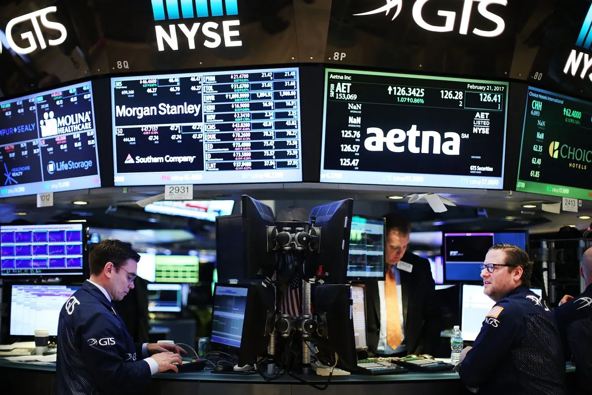 Traders work on the floor of the New York Stock Exchange on Feb. 21, 2017. (Spencer Platt/Getty Images)