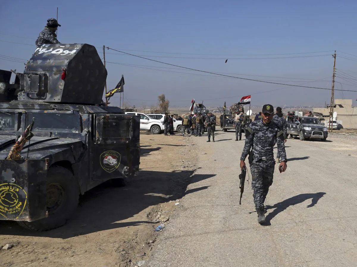 Iraqi Federal police deploy after regaining control of the town of Abu Saif, west of Mosul, Iraq on Feb. 22, 2017. (AP Photo/Khalid Mohammed)