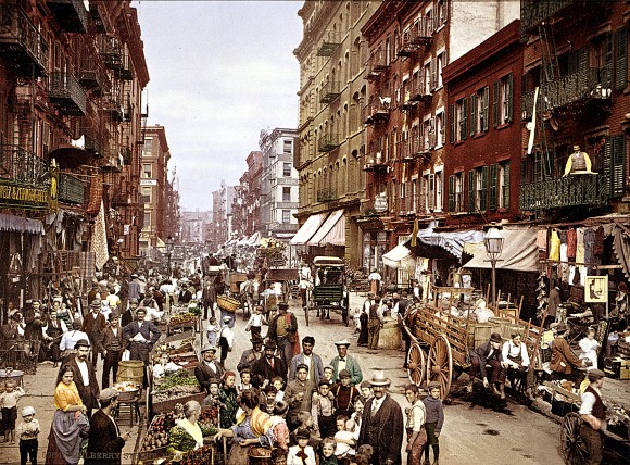 Mulberry Street market in New York in the early 1900s. Manhattan's Little Italy is a classic example of how immigrants from the same nation settled in clusters in their new land. (Library of Congress)