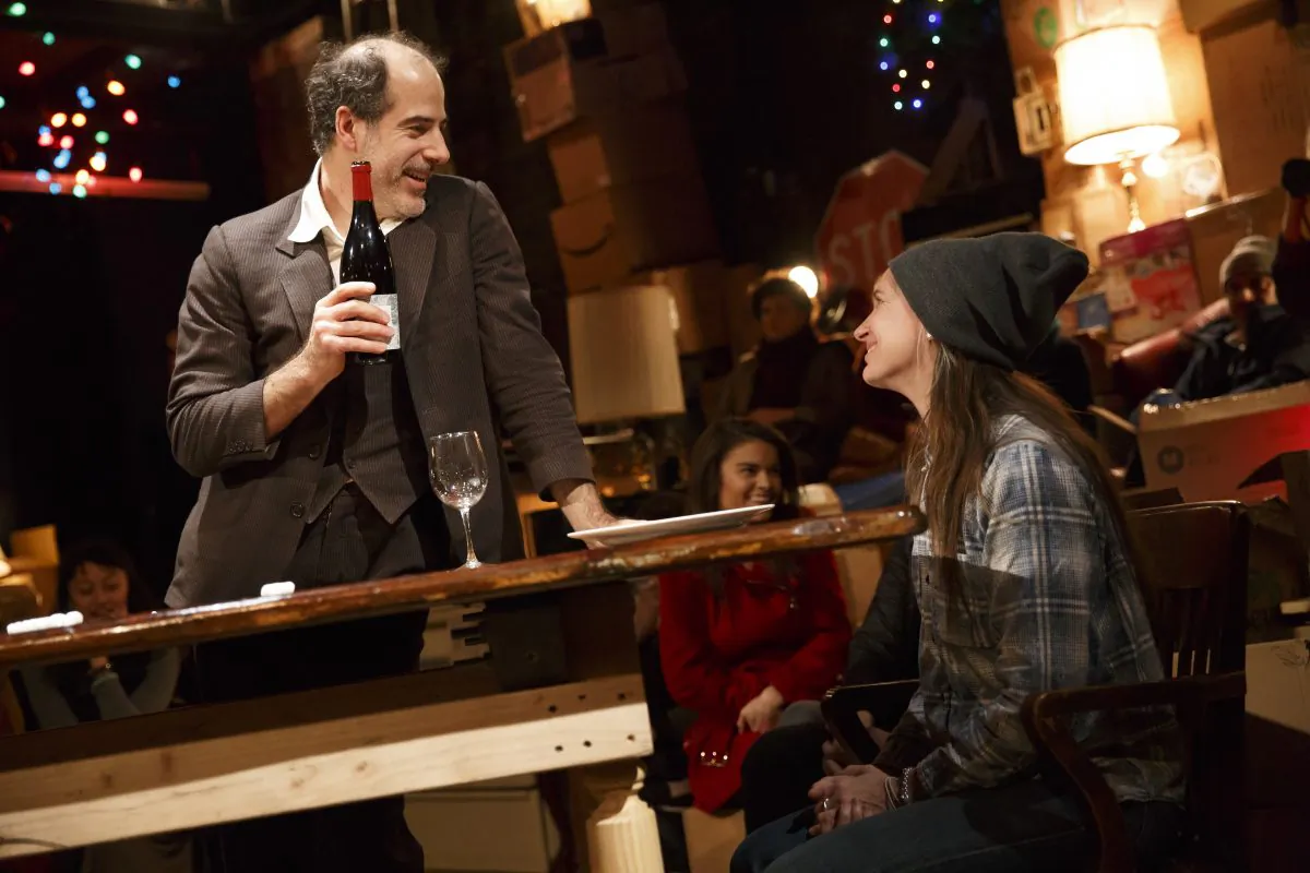 Geoff Sobelle and a guest from the audience in his one-man theater experience, “The Object Lesson.” (Joan Marcus)