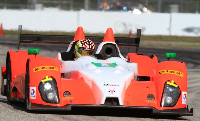 Sean Rayhall wheels the #8 Starworks PC Oreca around Turn Ten Friday morning. His team mate Chuck Quinton set the fastest lap in class. (Chris Jasurek/Epoch Times)