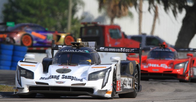 The Cadillac DPis of Mustang Sampling and Whelen Engineering swapped quick lap honors with the #10 Konica Cadillac. (Chris Jasurek/Epoch Times)