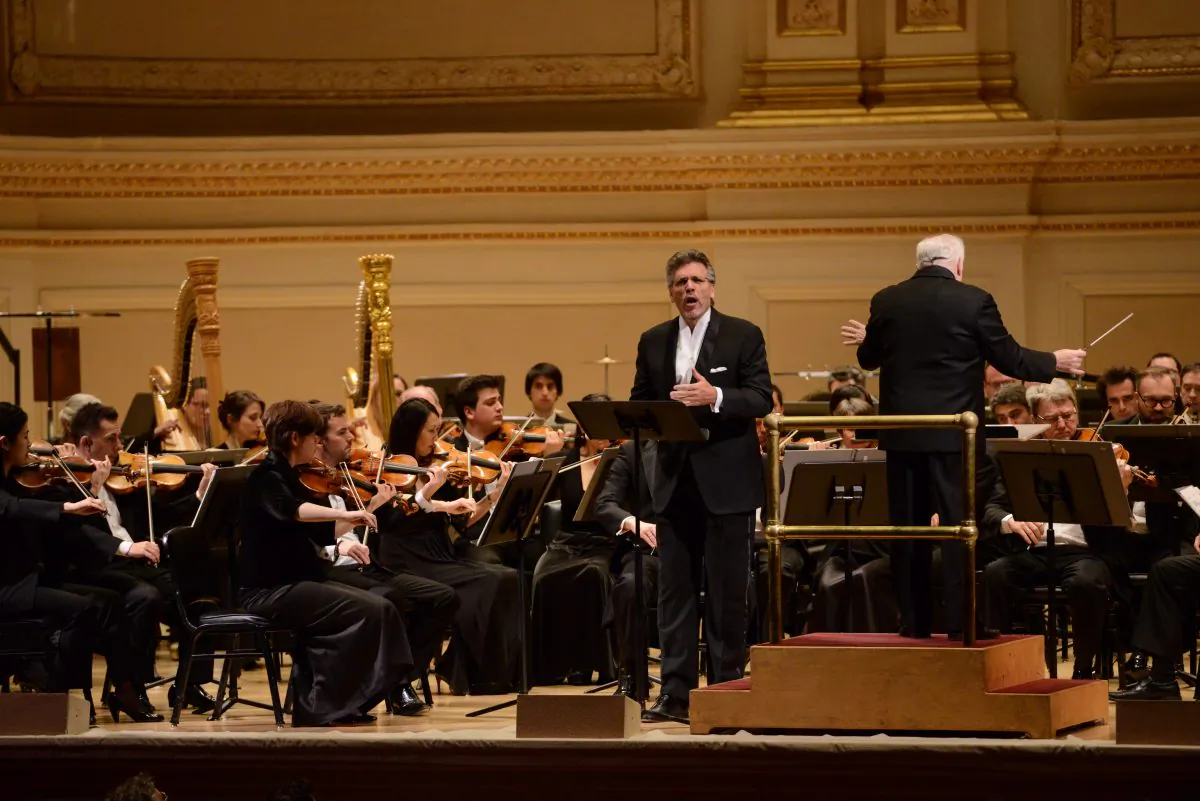 Orchestre National de Lyon and eminent baritone Thomas Hampson who narrated the first piece of the evening, “Antar.” (Pete Checchia)